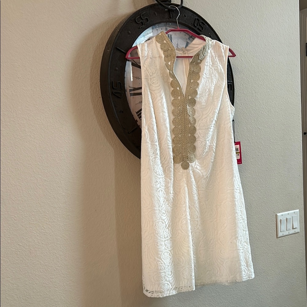 Elegant White Dress with Gold Accents